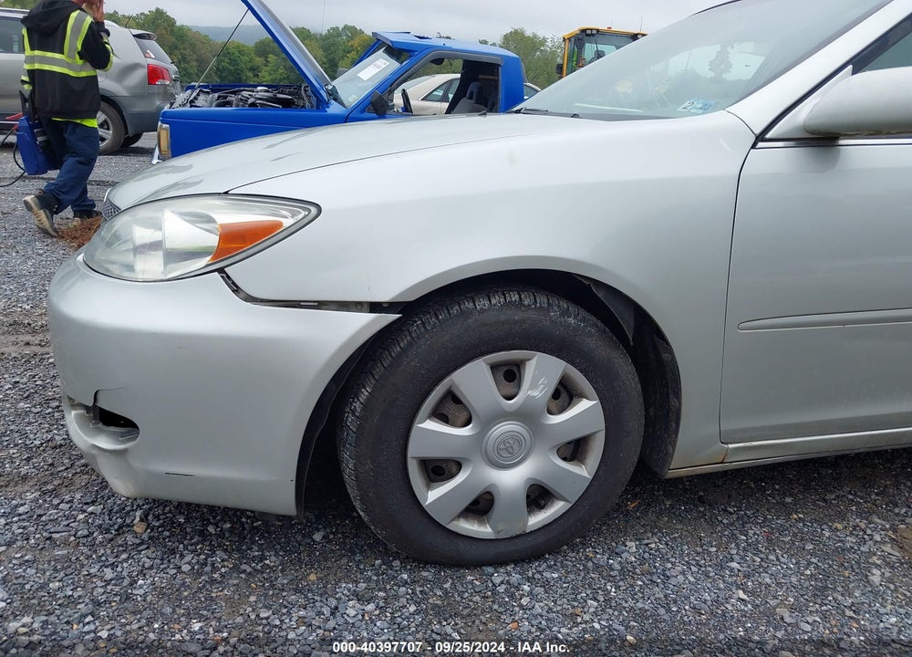 2003 TOYOTA CAMRY LE VIN: JTDBE32K930233227