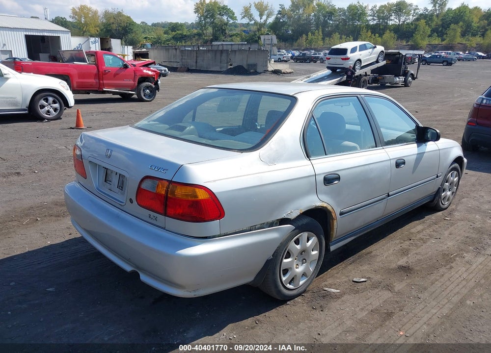 1999 HONDA CIVIC LX VIN: 2HGEJ6677XH561197
