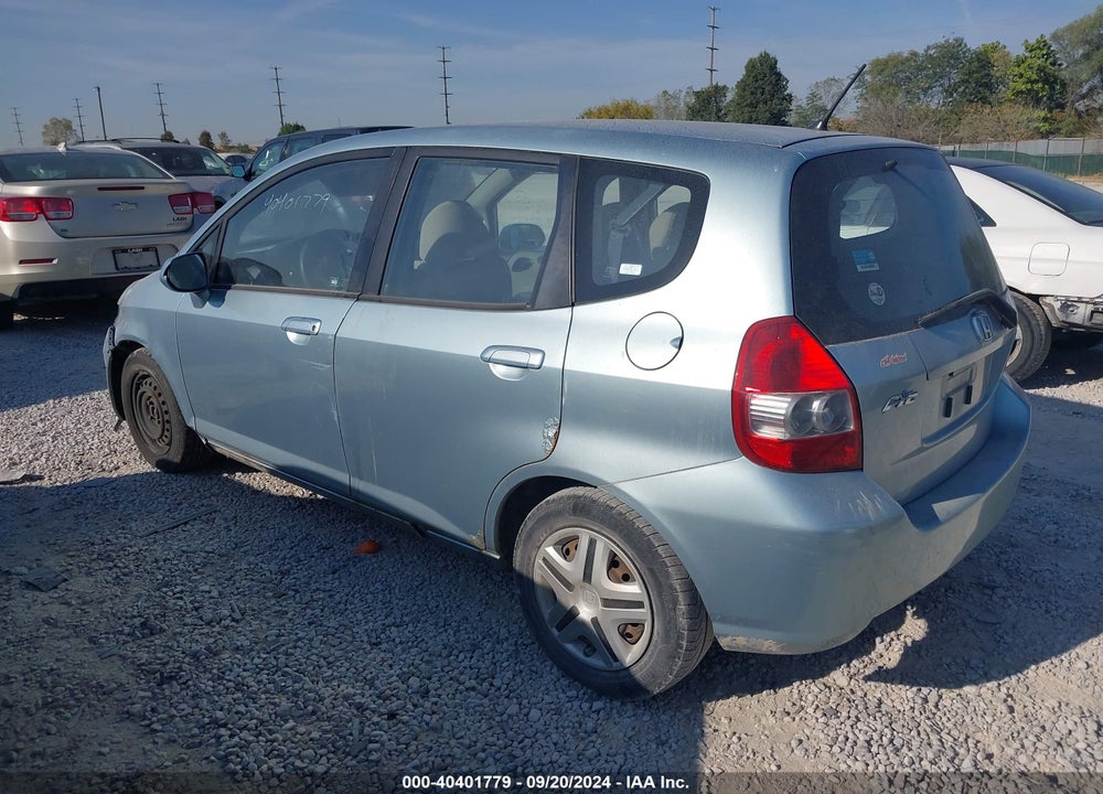 2007 HONDA FIT VIN: JHMGD38497S049061