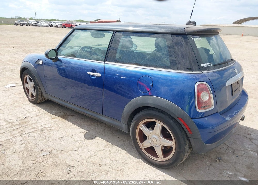 2007 MINI COOPER VIN: WMWMF33597TT51925
