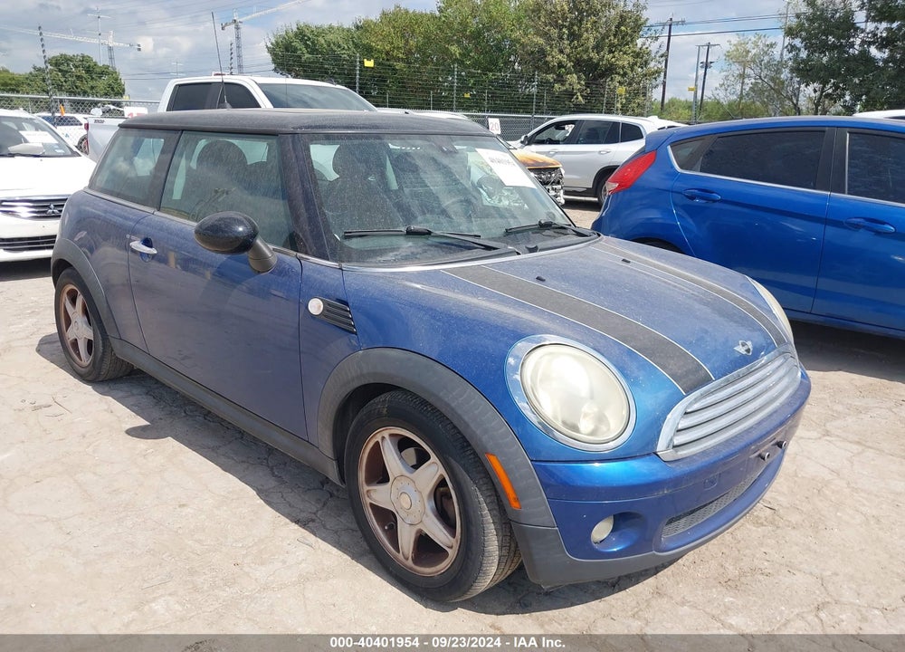 2007 MINI COOPER VIN: WMWMF33597TT51925
