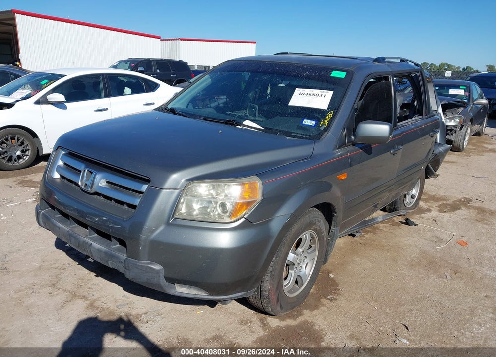 2007 HONDA PILOT EX-L VIN: 5FNYF28577B015765