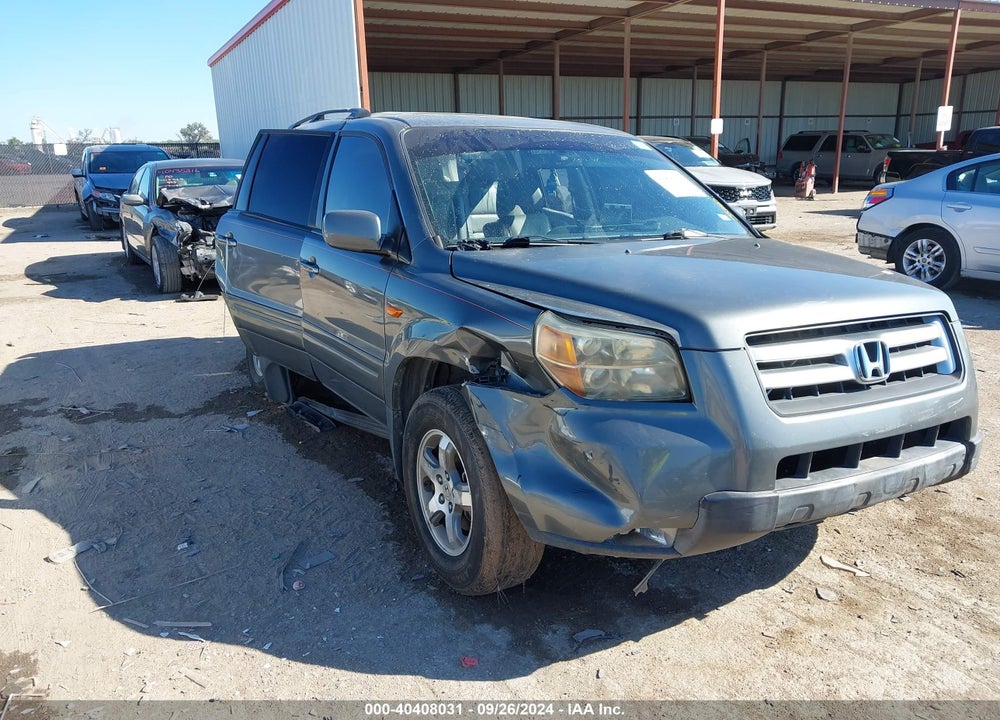 2007 HONDA PILOT EX-L VIN: 5FNYF28577B015765