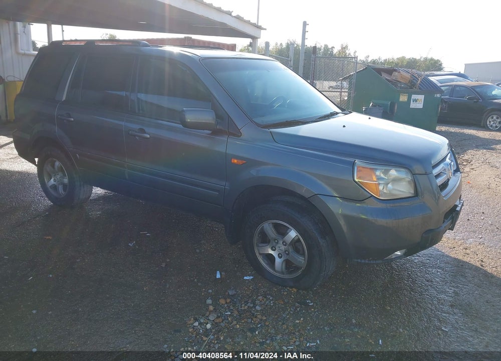 2007 HONDA PILOT EX-L VIN: 5FNYF28617B001174