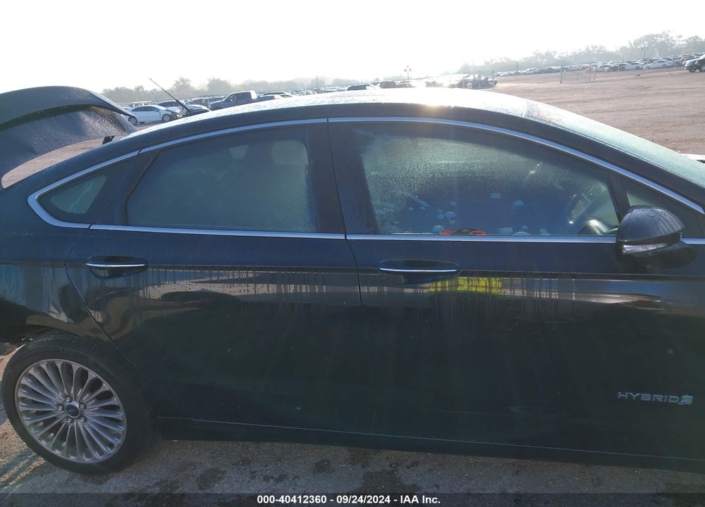 2014 FORD FUSION HYBRID TITANIUM VIN: 3FA6P0RU5ER376668