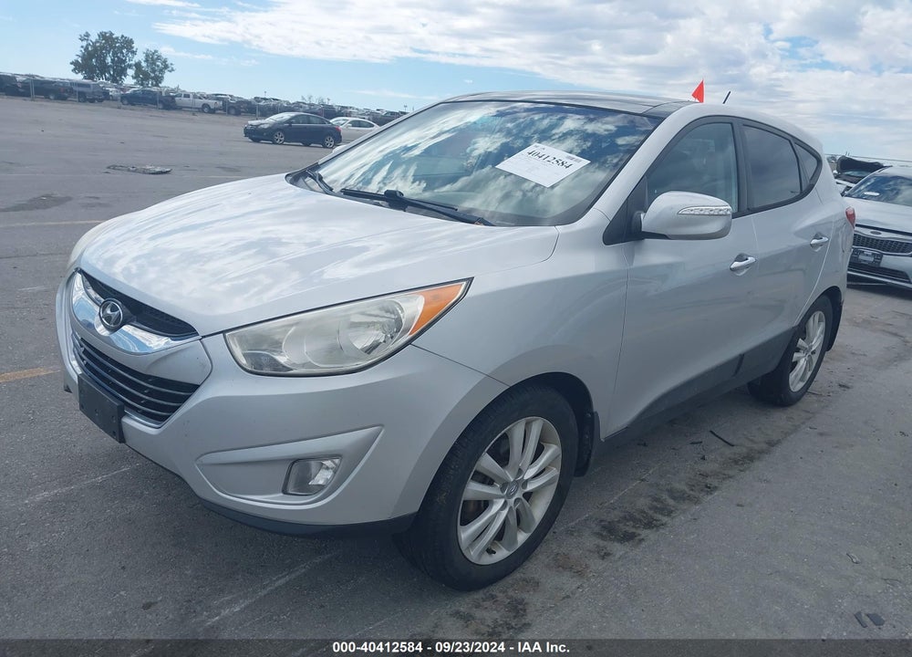 2012 HYUNDAI TUCSON LIMITED VIN: KM8JUCAC6CU381011