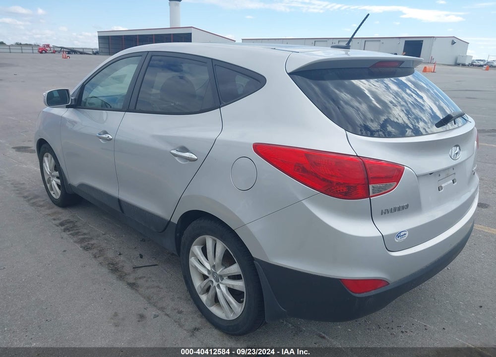 2012 HYUNDAI TUCSON LIMITED VIN: KM8JUCAC6CU381011