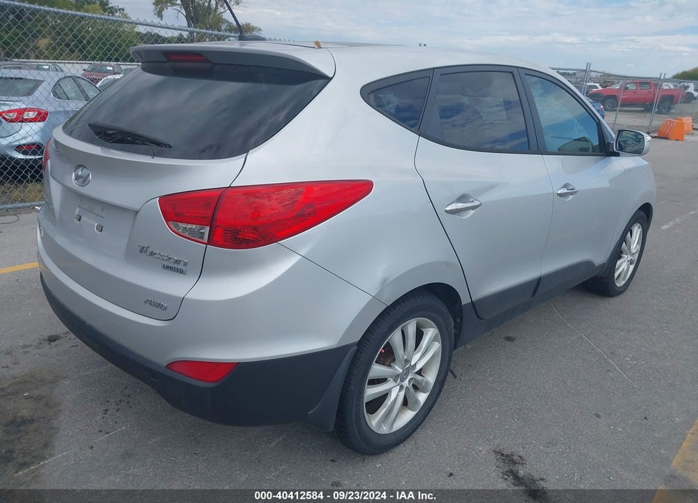 2012 HYUNDAI TUCSON LIMITED VIN: KM8JUCAC6CU381011