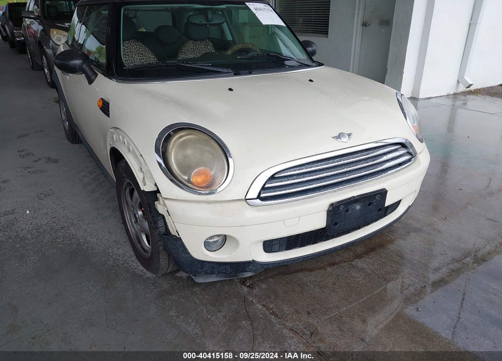 2007 MINI COOPER VIN: WMWMF33527TT57551