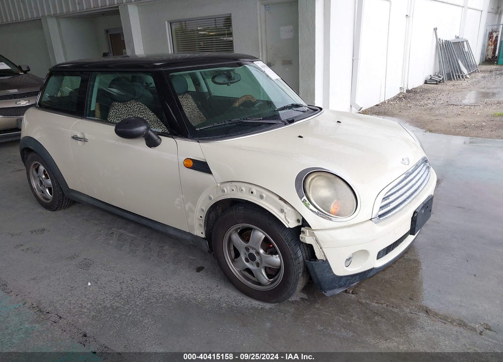 2007 MINI COOPER VIN: WMWMF33527TT57551