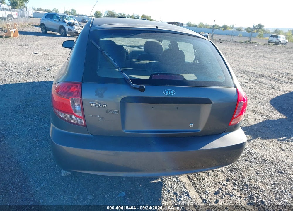 2003 KIA RIO CINCO VIN: KNADC165536153294