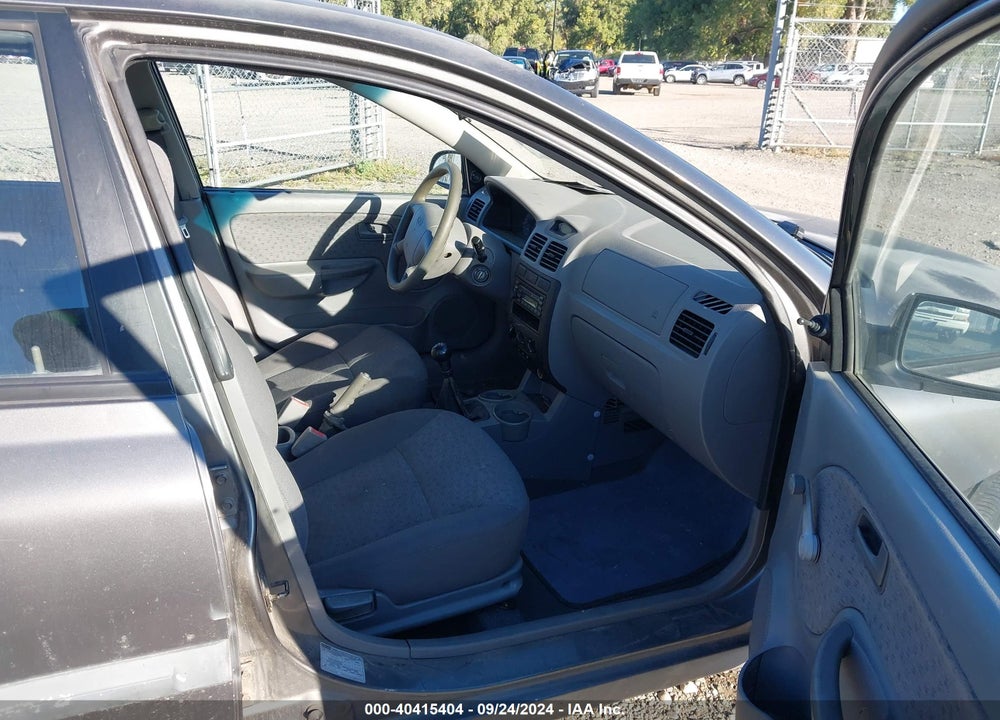 2003 KIA RIO CINCO VIN: KNADC165536153294