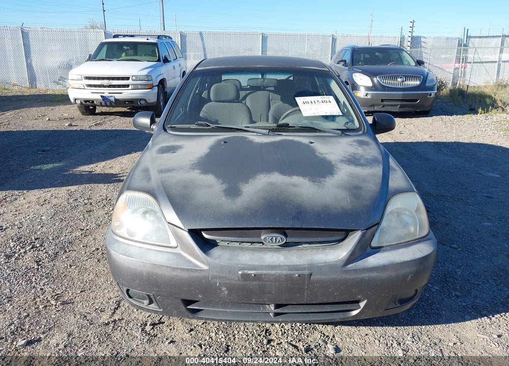 2003 KIA RIO CINCO VIN: KNADC165536153294