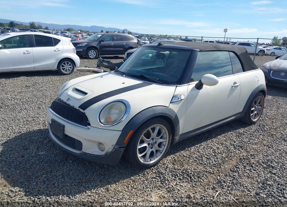 2009 MINI COOPER S VIN: WMWMS33569TG89591