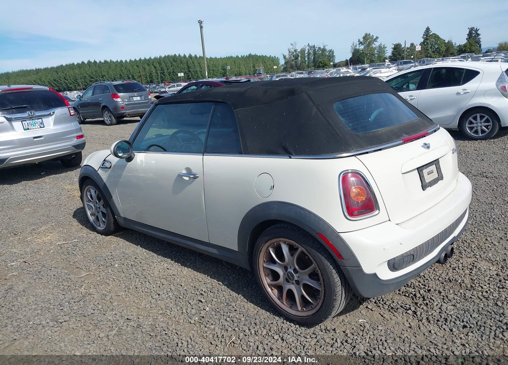 2009 MINI COOPER S VIN: WMWMS33569TG89591