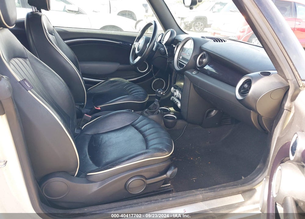 2009 MINI COOPER S VIN: WMWMS33569TG89591