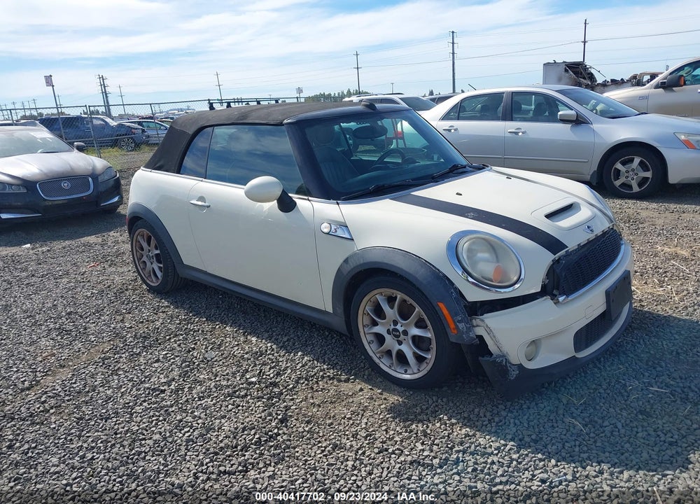 2009 MINI COOPER S VIN: WMWMS33569TG89591