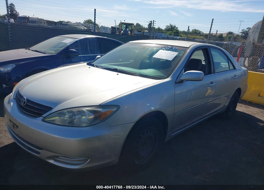 2003 TOYOTA CAMRY LE VIN: JTDBE32KX30172454