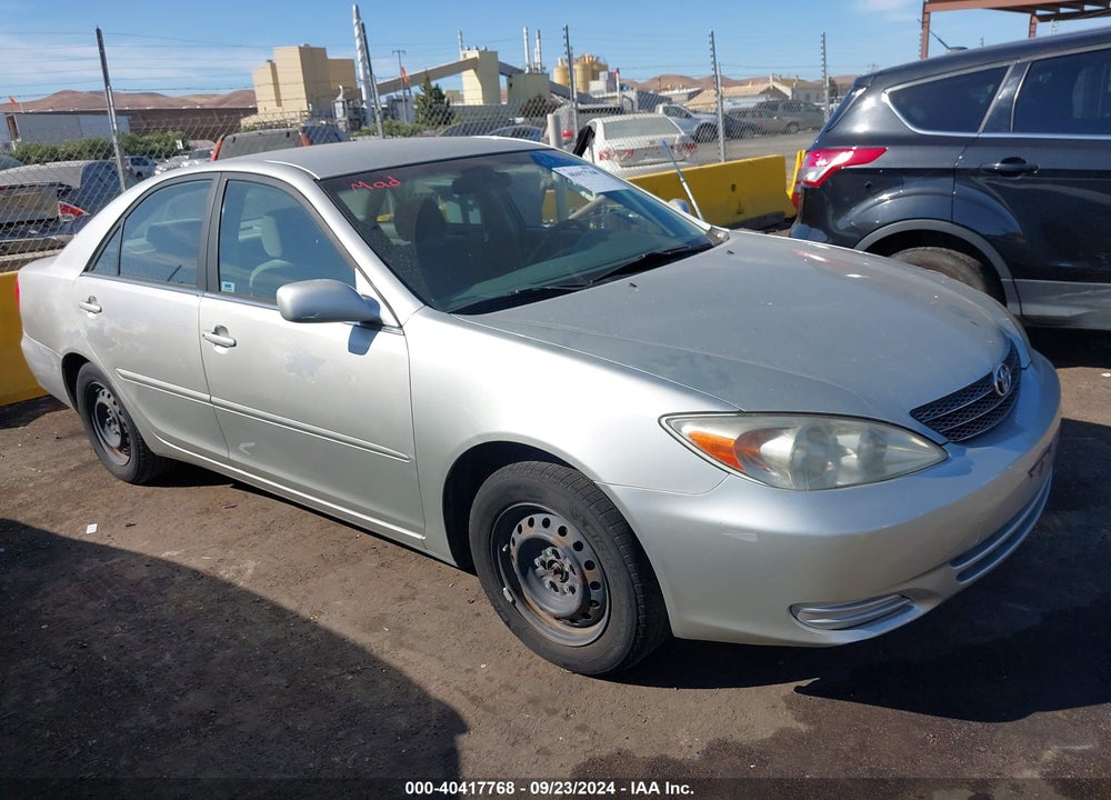 2003 TOYOTA CAMRY LE VIN: JTDBE32KX30172454