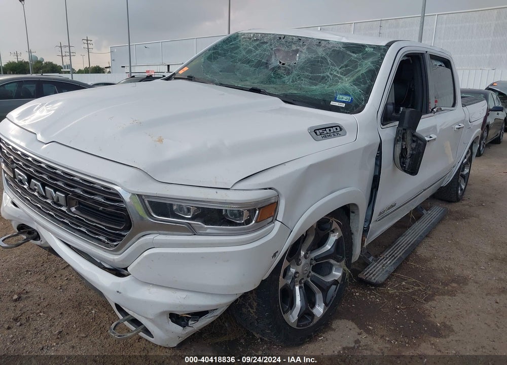 2020 RAM 1500 LIMITED 4X4 5'7 BOX VIN: 1C6SRFHT1LN407596