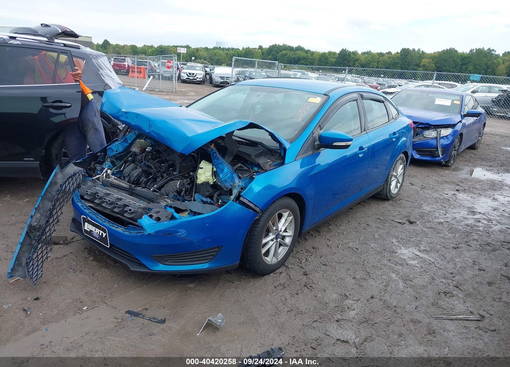 2016 FORD FOCUS SE VIN: 1FADP3F2XGL305303