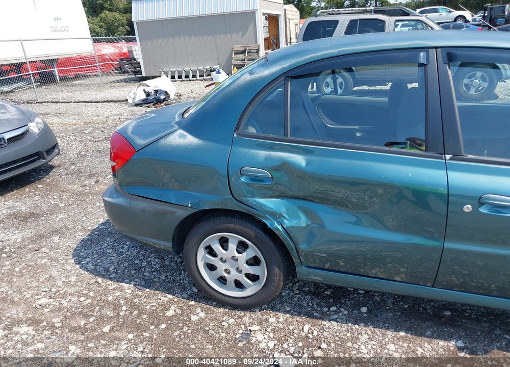 2003 KIA RIO VIN: KNADC125736253404