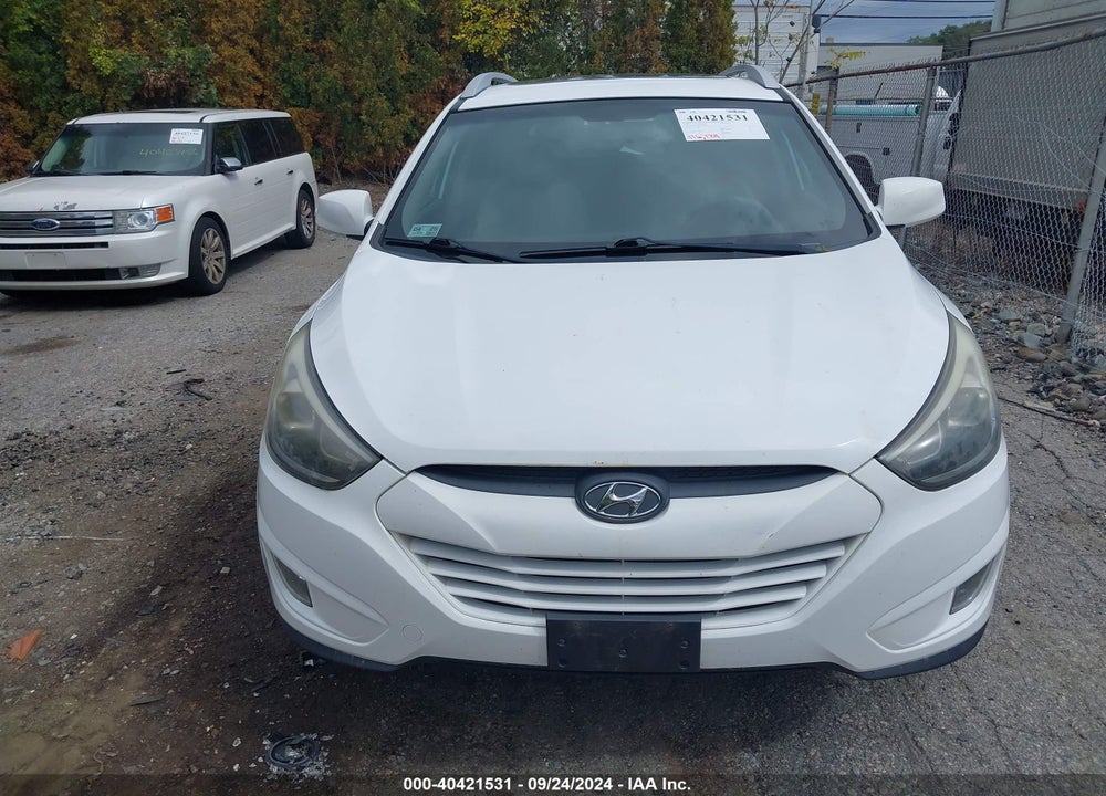 2014 HYUNDAI TUCSON SE VIN: KM8JUCAG2EU864095