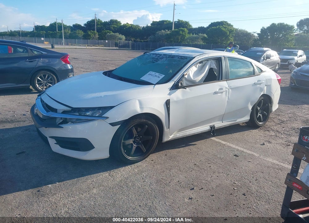 2018 HONDA CIVIC LX VIN: 19XFC2F51JE004275