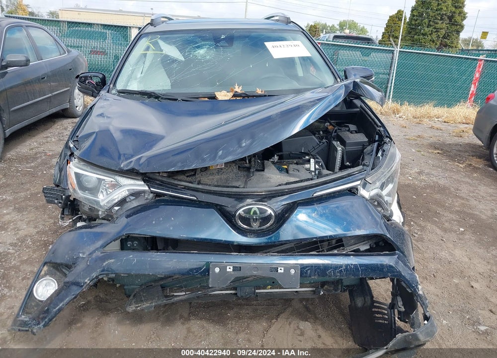 2018 TOYOTA RAV4 XLE VIN: JTMRFREV4JJ242395