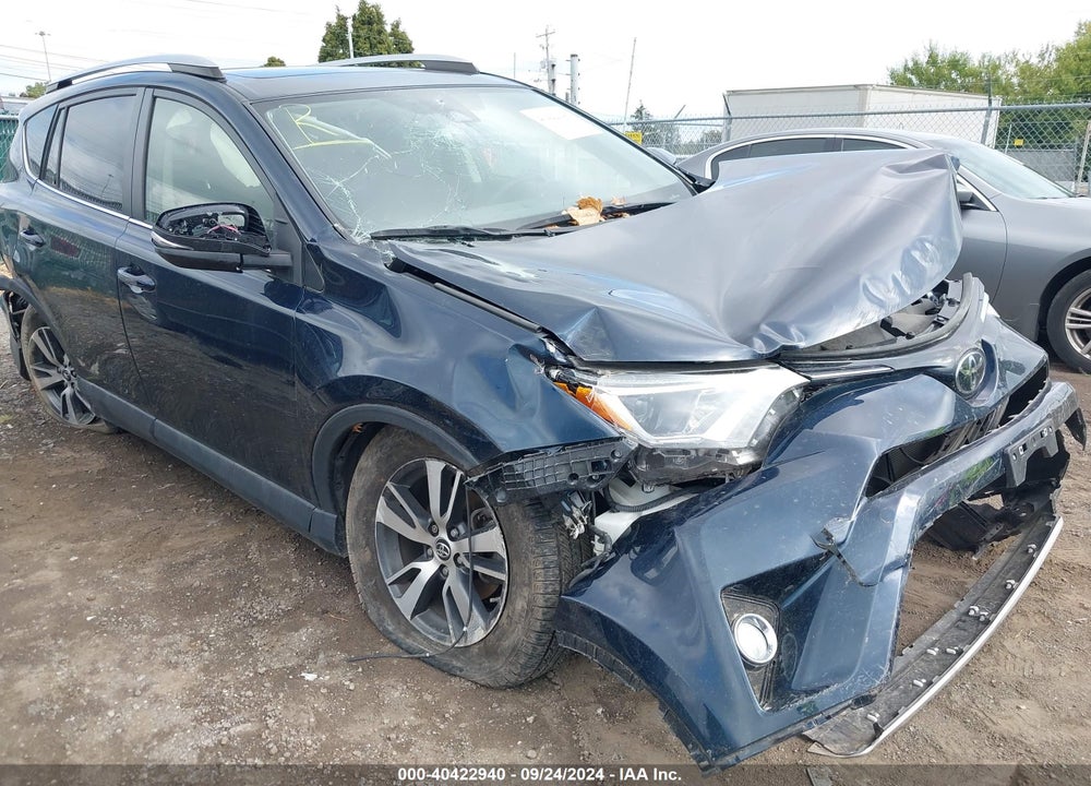 2018 TOYOTA RAV4 XLE VIN: JTMRFREV4JJ242395