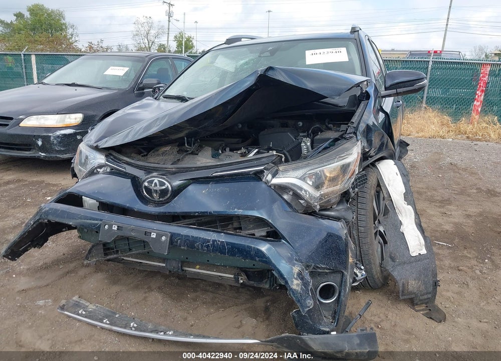 2018 TOYOTA RAV4 XLE VIN: JTMRFREV4JJ242395