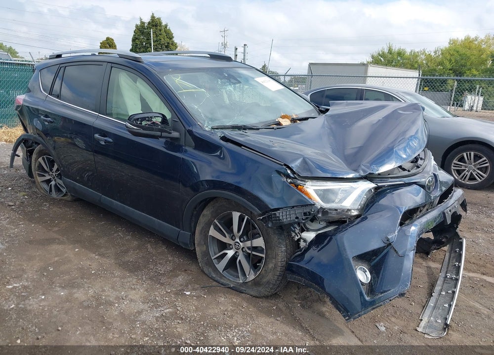 2018 TOYOTA RAV4 XLE VIN: JTMRFREV4JJ242395