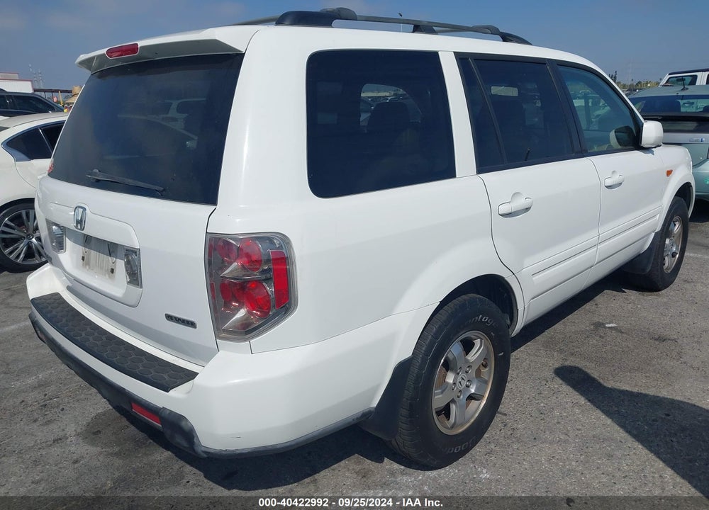 2007 HONDA PILOT EX-L VIN: 2HKYF185X7H522154