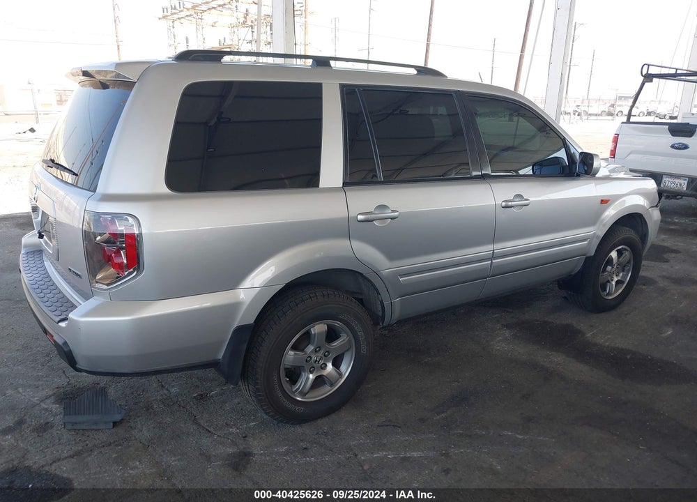 2006 HONDA PILOT EX-L VIN: 2HKYF18526H511499