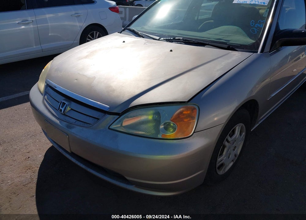 2002 HONDA CIVIC LX VIN: 1HGES16572L021679