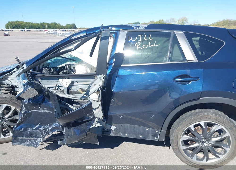 2016 MAZDA CX-5 GRAND TOURING VIN: JM3KE4DY2G0698002