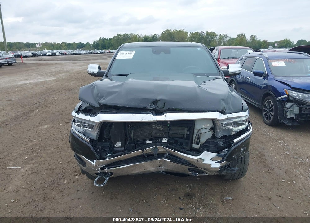 2019 RAM 1500 LIMITED 4X4 5'7 BOX VIN: 1C6SRFHT1KN773587