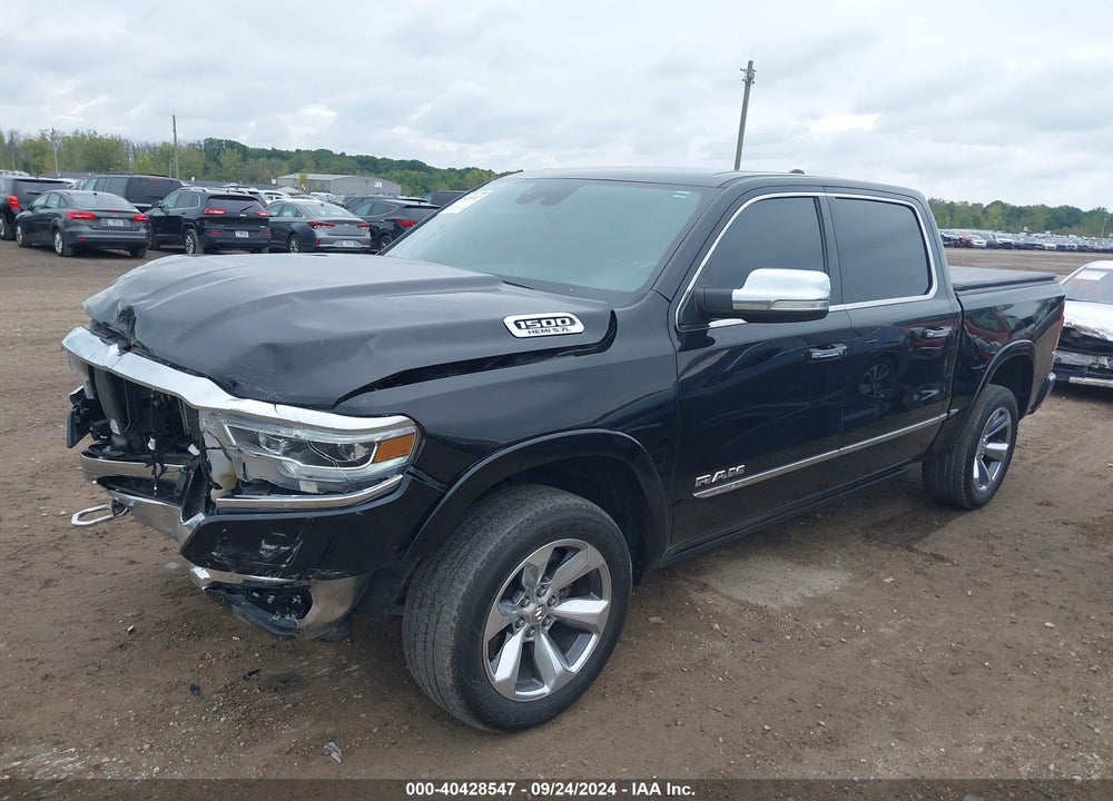 2019 RAM 1500 LIMITED 4X4 5'7 BOX VIN: 1C6SRFHT1KN773587