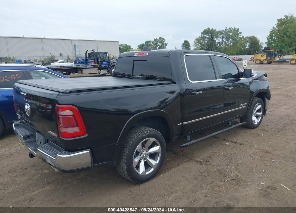2019 RAM 1500 LIMITED 4X4 5'7 BOX VIN: 1C6SRFHT1KN773587