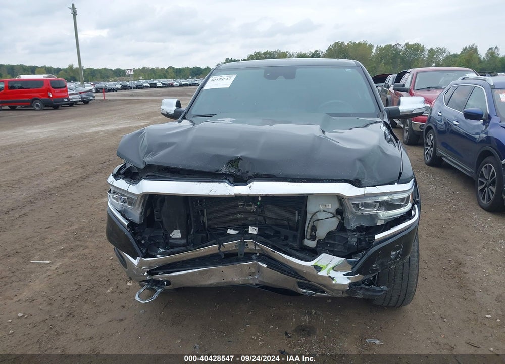 2019 RAM 1500 LIMITED 4X4 5'7 BOX VIN: 1C6SRFHT1KN773587
