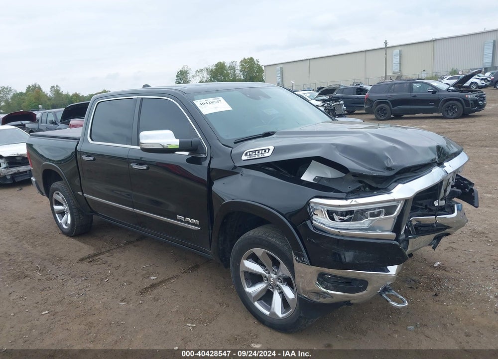 2019 RAM 1500 LIMITED 4X4 5'7 BOX VIN: 1C6SRFHT1KN773587