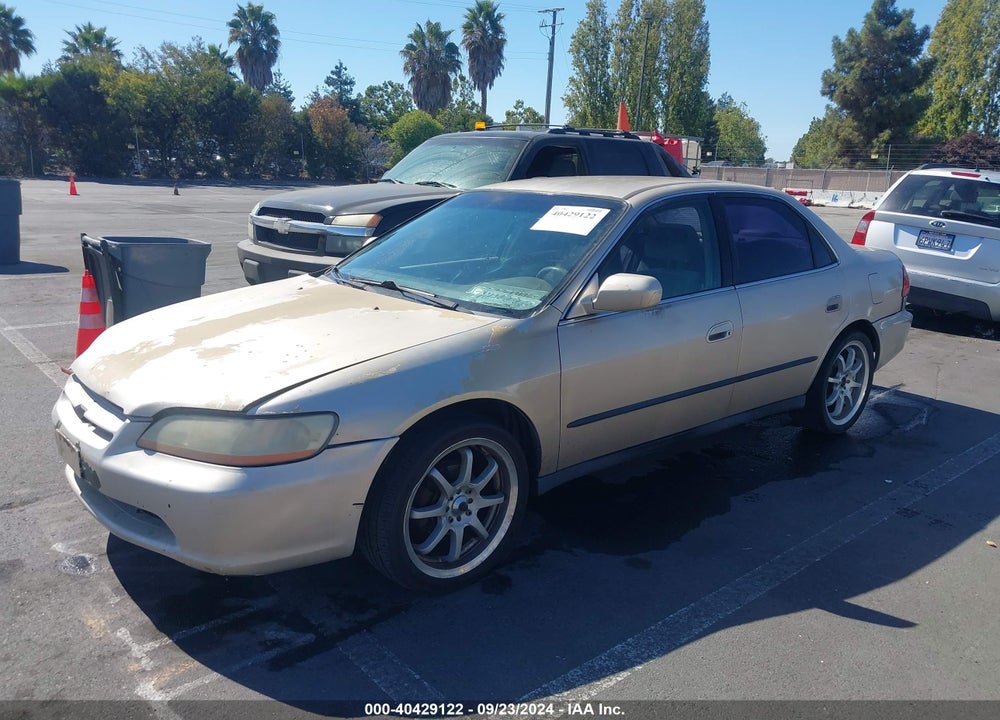2000 HONDA ACCORD 2.3 LX VIN: 3HGCG6651YG702044