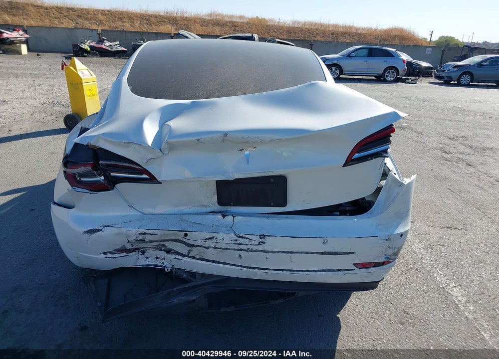 2021 TESLA MODEL 3 STANDARD RANGE PLUS REAR-WHEEL DRIVE VIN: 5YJ3E1EA7MF941409