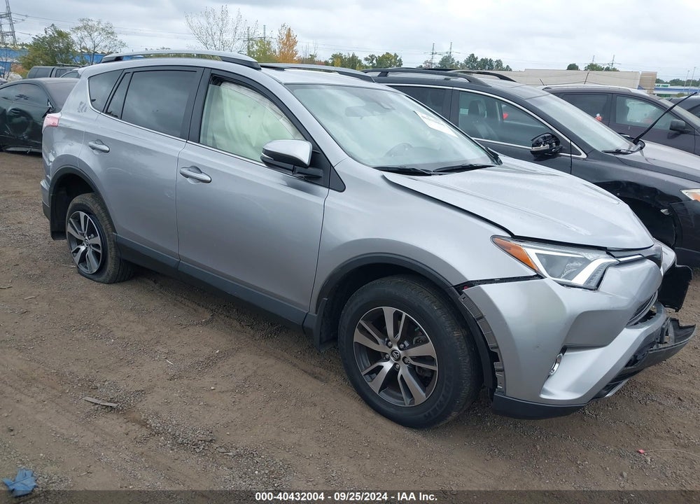 2018 TOYOTA RAV4 XLE VIN: JTMRFREV9JD240852