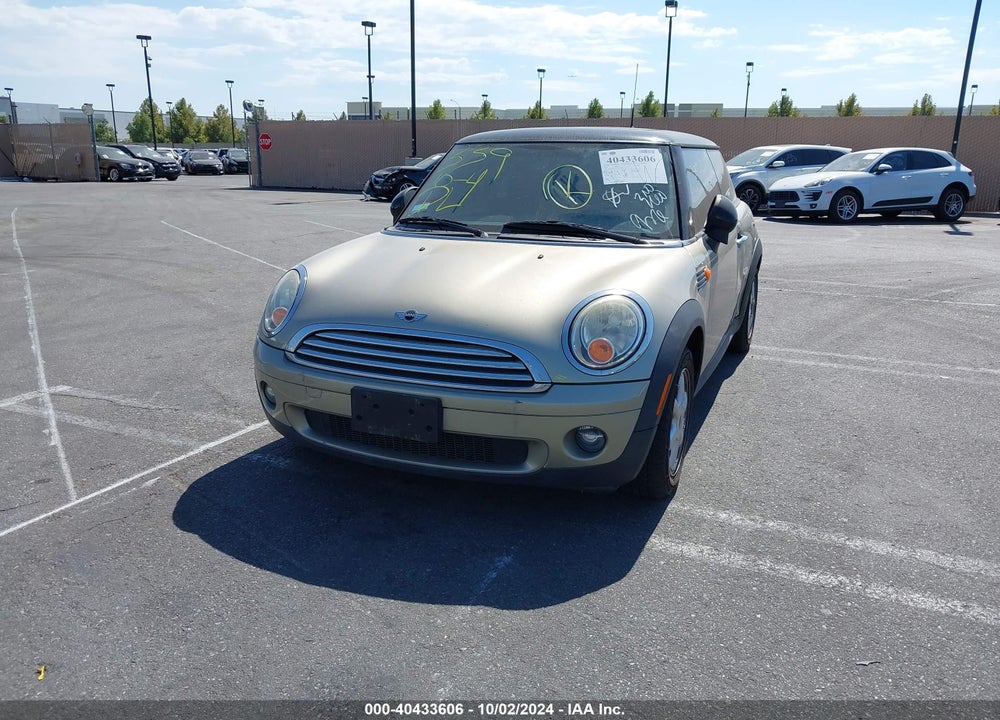 2009 MINI COOPER VIN: WMWMF33579TU74805