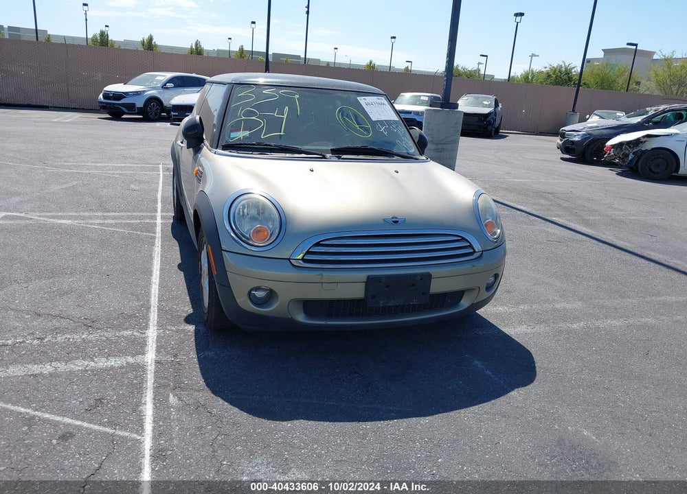 2009 MINI COOPER VIN: WMWMF33579TU74805