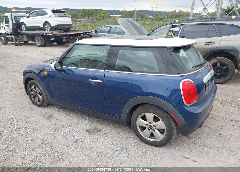2015 MINI HARDTOP COOPER VIN: WMWXM5C56FT942730