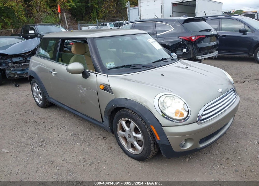 2009 MINI COOPER VIN: WMWMF33539TT69517