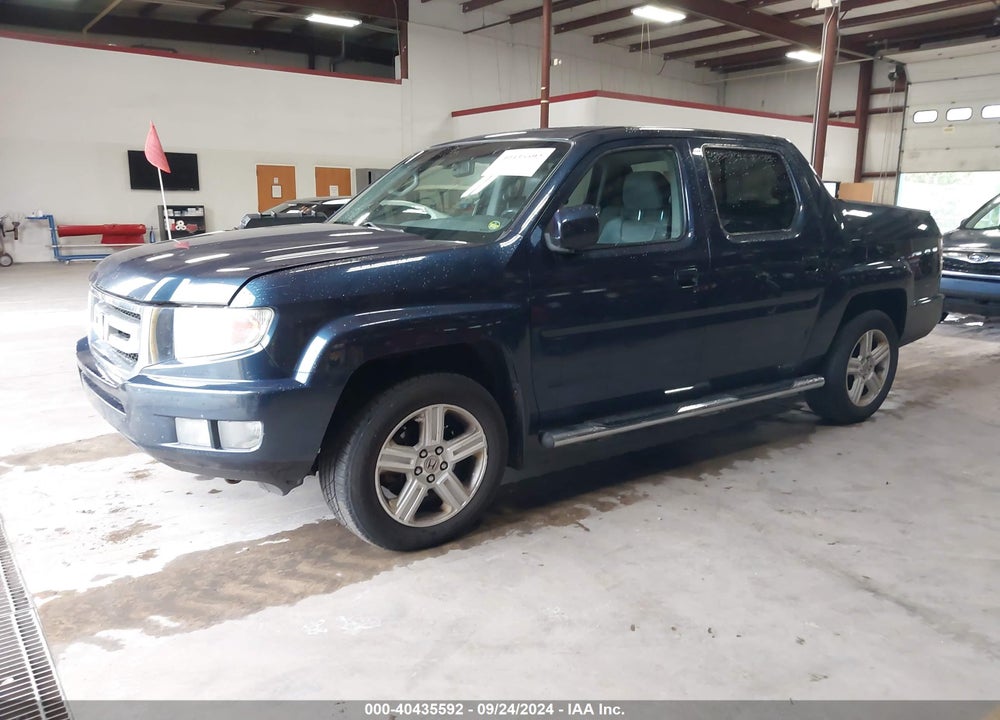 2011 HONDA RIDGELINE RTL VIN: 5FPYK1F52BB008070