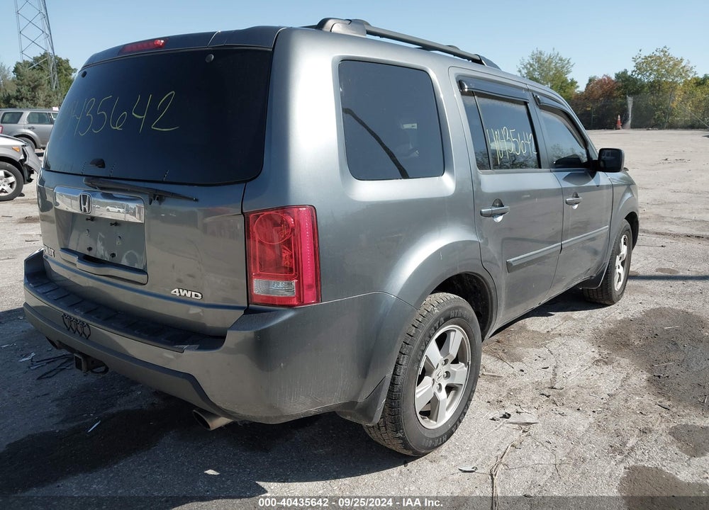 2011 HONDA PILOT EX-L VIN: 5FNYF4H76BB044051
